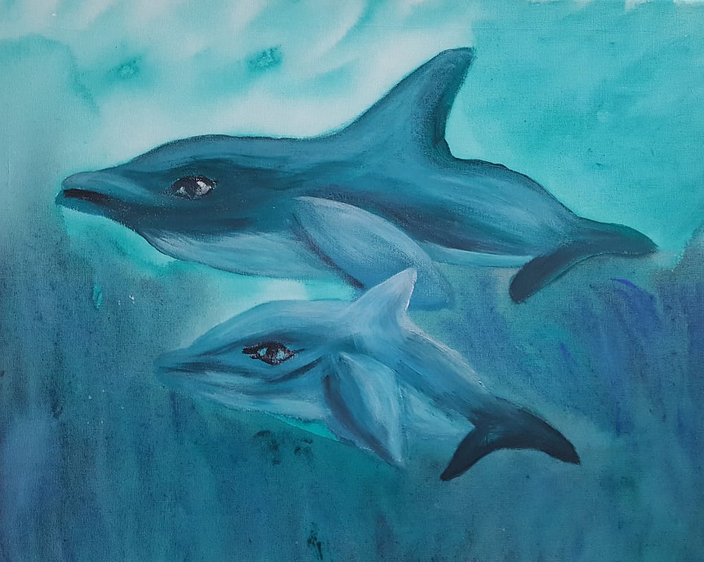 Dolphins on a blue background.